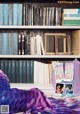 A person laying on a bed in front of a bookshelf.