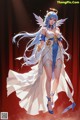 A woman in a white dress with blue hair and wings.